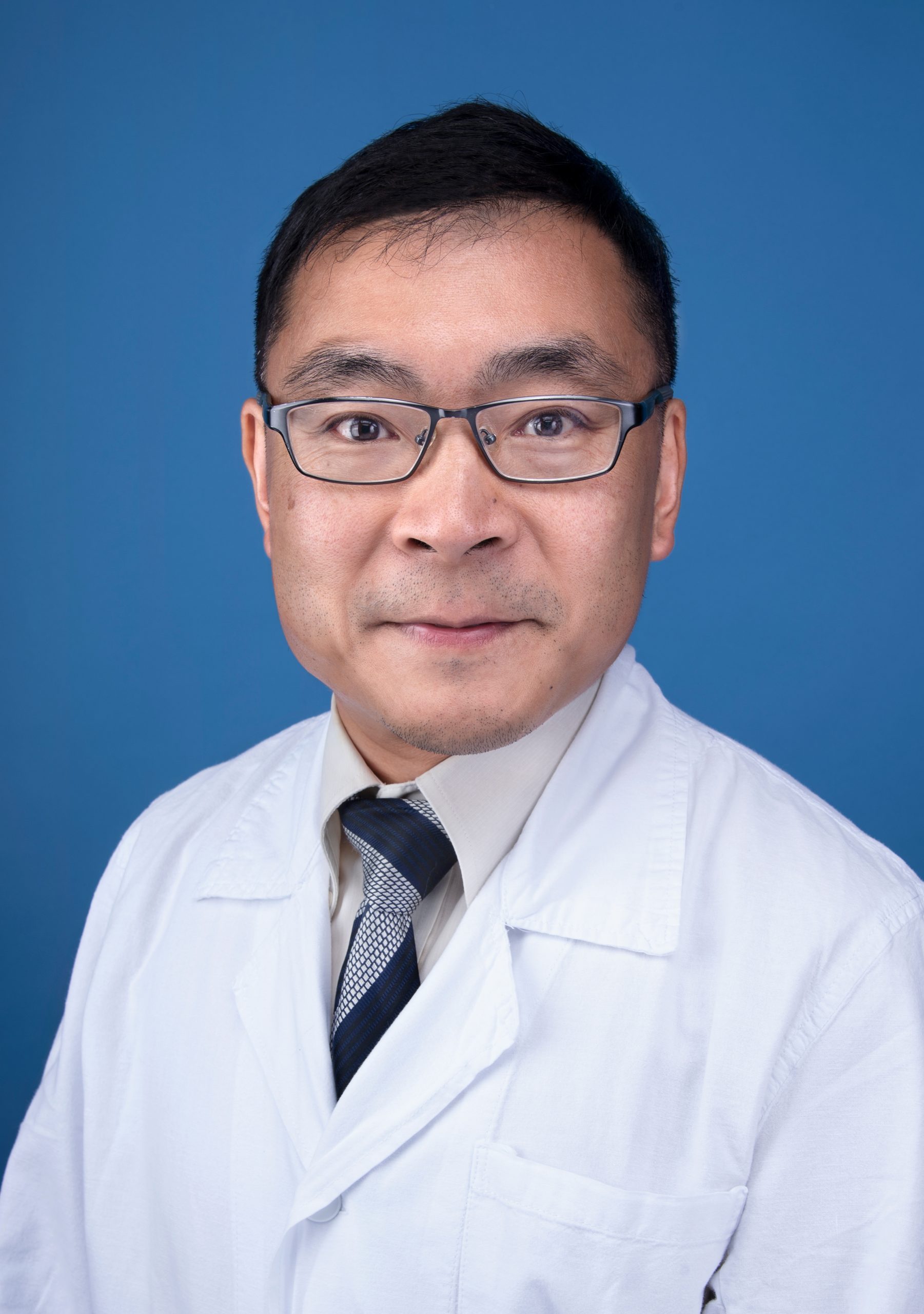 Dr TW Lau